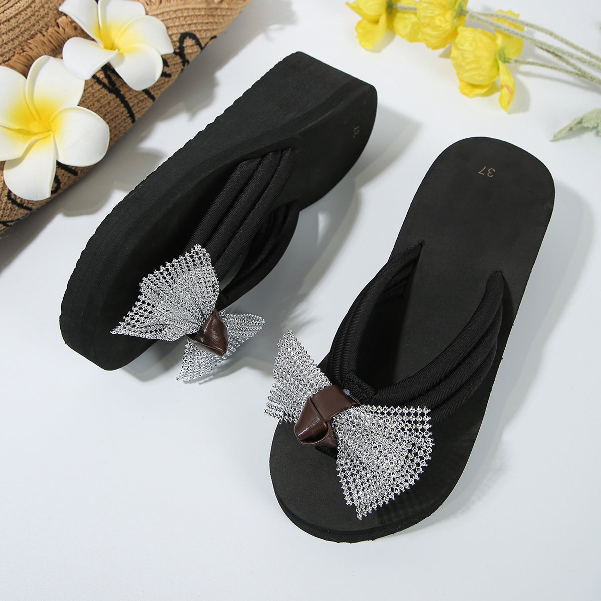 Schwarze Schleifen-Flip-Flops - Ella