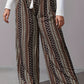 Bunte weite Boho-Hose mit Ethnomuster und Kordelzug - Mila