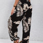 Schwarze Palmen-Print-Hose - Mia