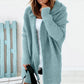 Grauer Oversized Strickmantel mit Kapuze - CozyFit